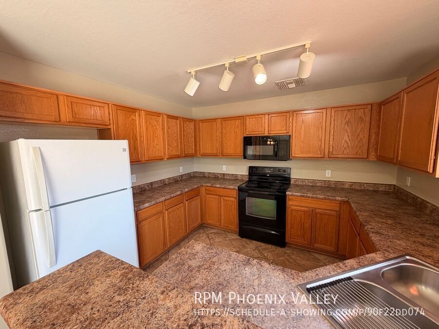 Updated 4x2 Buckeye Home *NO* Carpet & Downstairs Primary Bed! property image