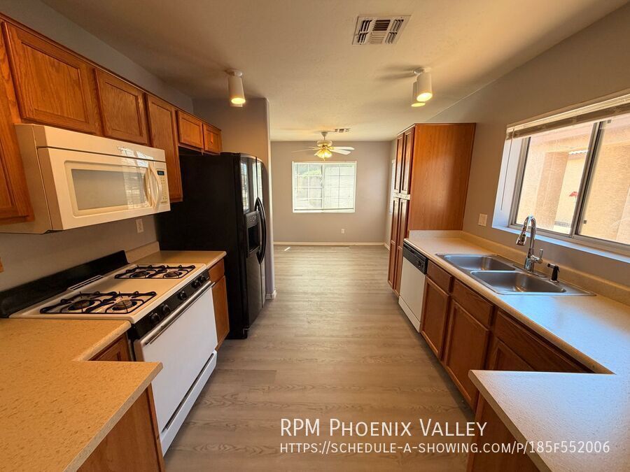 3 BR/2 Bath El Mirage Home *NEW* Flooring, *NEW* Paint & *NO HOA*! property image