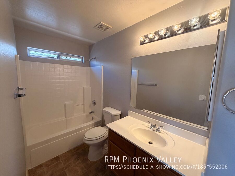 3 BR/2 Bath El Mirage Home *NEW* Flooring, *NEW* Paint & *NO HOA*! property image